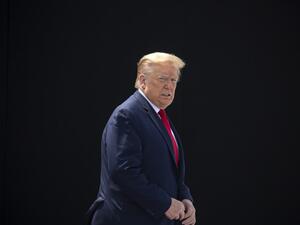 President Donald Trump waits on the rooftop of the Operational Building at NASA before the launch of the SpaceX Falcon 9 rocket with NASA astronauts Bob Behnken (R) and Doug Hurley aboard the rocket from the Kennedy Space Center on May 30, 2020 in Cape Canaveral, Florida. Saul MARTINEZ / GETTY IMAGES NORTH AMERICA / Getty Images via AFP