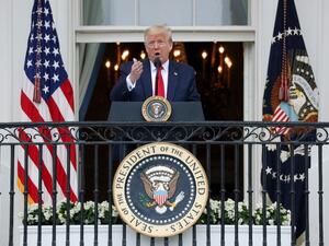 U.S. President Donald Trump speaks from the Truman Balcony during a Rolling to Remember Ceremony: Honoring Our Nations Veterans and POW/MIA at the White House May 22, 2020 in Washington, DC. (AFP/File)