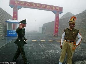  150 soldiers from China (left) and India (right) were seen fighting against each other in the strategic mountain pass of Nathu La (pictured) on Saturday. (AFP)