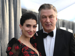 Actor Alec Baldwin (R) and wife Hilaria Baldwin walk the red carpet at the 25th Annual Screen Actors Guild Awards at the Shrine Auditorium in Los Angeles on January 27, 2019. (Photo by Robyn Beck / AFP)