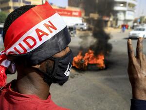 Scores of protesters were killed when armed men in military fatigues stormed the sprawling encampment outside Khartoum's army headquarters on June 3 last year. ASHRAF SHAZLY / AFP