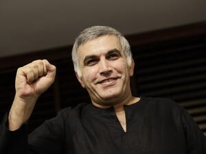 In this file photo taken on November 2, 2014 Bahraini human rights activist Nabeel Rajab gestures at his home in the village of Bani Jamrah, West of Manama. The prominent Bahraini rights activist was freed from jail on June 9, 2020 after being sentenced to five years imprisonment for tweeting criticism of the Saudi-led military campaign in Yemen. MOHAMMED AL-SHAIKH / AFP