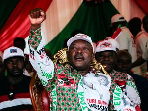 In this file photo taken on May 16, 2020 Burundi’s incumbent president Pierre Nkurunziza raises his fist as he reacts to supporters during the last campaign rally of the candidate of the ruling party the National Council for the Defense of Democracy - Forces for the Defense of Democracy (CNDD-FDD), in Bujumbura. (AFP/File)