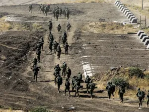 Israeli army soldiers take part in a military drill in the Israeli-annexed Golan Heights on June 24, 2020. JALAA MAREY / AFP