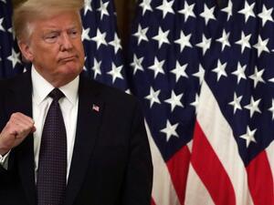 U.S. President Donald Trump gestures during an East Room event to announce the PREVENTS Task Force at the White House June 17, 2020 in Washington, DC. President Trump held the event to announce plans to prevent suicides among U.S. military veterans. Alex Wong/Getty Images/AFP