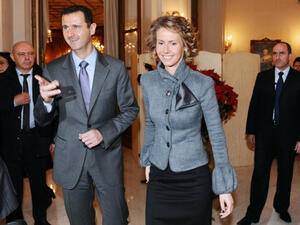 Bashar Al Asad and his wife Asma (MIGUEL MEDINA/AFP/Getty Images)