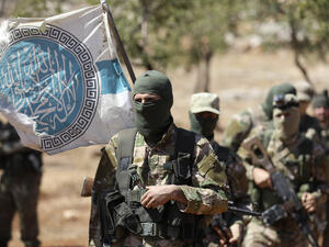 HTS has opted for a pragmatic approach toward Ankara after allowing the circulation of Turkish lira as an alternative to the devalued Syrian currency. (AFP)