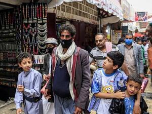 The plane from Egypt with 174 Yemenis onboard landed in Seiyun Airport in Hadramout, and all arrivals had to undergo coronavirus PCR tests (AFP)