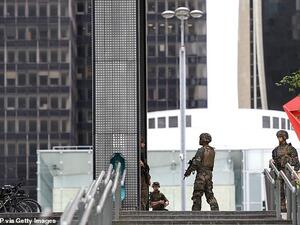 Soldiers were also pictured standing guard in the typically-bustling business district, which was completely cordoned off while the police carried out a search. (AFP/File)