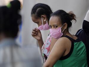 Ethiopian domestic workers wait outside their country's consulate to register for repatriation in Beirut, on 18 May 2020 (AFP)