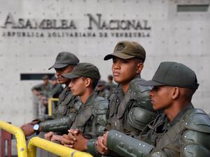 In this file photo taken on January 05, 2020, members of the Bolivarian National Guard stand guard outside of the National Assembly in Caracas. Venezuela will hold elections in December to renew the National Assembly, the only institution in opposition hands, the electoral authority announced on June 30, 2020. Yuri CORTEZ / AFP