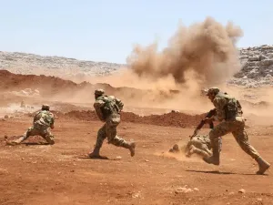 Members of Syria's opposition National Liberation Front take part in a military training in the northern countryside of Idlib province, on July 1, 2020. AAREF WATAD / AFP