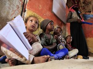 Children of Yemen's minority group known as "Muhamasheen" -- literally the "Marginalised" attend a lesson at a slum in the capital Sanaa on July 4, 2020. At a time when the Black Lives Matter movement is reshaping societies, black Yemenis have scant hope for an end to centuries of discrimination that has only worsened during the civil war. In Sanaa, members of the minority group known as "Muhamasheen" live in dismal conditions in densely populated slums. They count among the poorest of the poor in the Arab 