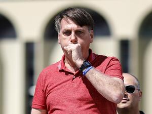 Brazil President Jair Bolsonaro announced on July 7, 2020 he had tested positive for the coronavirus but said he was feeling "perfectly well" and had only mild symptoms. Sergio LIMA / AFP