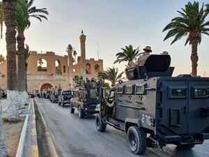 Vehicles of the "Tripoli Brigade", a militia loyal to the UN-recognised Government of National Accord (GNA), parade through the Martyrs' Square at the centre of the GNA-held Libyan capital Tripoli on July 10, 2020. Mahmud TURKIA / AFP