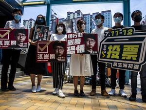 o-democracy parties in Hong Kong held primary polls on July 11 and 12 to choose candidates for upcoming legislative elections despite warnings from government officials that it may be in breach of a new security law imposed by China. ISAAC LAWRENCE / AFP