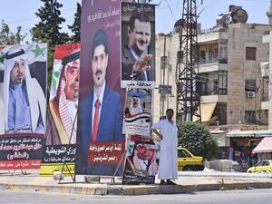 Campaign posters of candidates for the upcoming Syrian parliamentary election are displayed in the northern city of Aleppo, on July 15, 2020. AFP