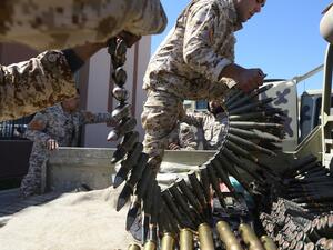 In this file photo taken on April 08, 2019, fighters from a Misrata armed group loyal to the internationally recognised Libyan Government of National Accord (GNA) prepare their ammunition before heading to the frontline as battles against Forces of Libyan strongman Khalifa Haftar, in Tripoli The US charged on July 16, 2020, that the EU's Operation Irini to enforce a UN embargo on sending weapons to war-torn Libya lacked seriousness, sharing Turkey's criticism that the effort is biased. Mahmud TURKIA / AFP