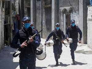 Palestinian security forces patrol an area in Gaza City on July 18, 2020, during a lockdown imposed to stop the spread the COVID-19 coronavirus pandemic. MAHMUD HAMS / AFP