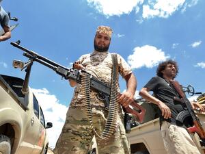 Fighters loyal to the UN-recognised Libyan Government of National Accord (GNA) secure the area of Abu Qurain, half-way between the capital Tripoli and Libya's second city Benghazi, against forces loyal to Khalifa Haftar, who is based in eastern Benghazi, on July 20, 2020. Since 2015, a power struggle has pitted the (GNA) against forces loyal to Haftar. The strongman is mainly supported by Egypt, the United Arab Emirates and Russia, while Turkey backs the GNA.  Mahmud TURKIA / AFP