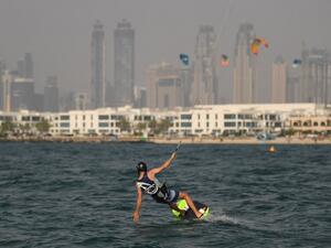 An athlete kite-surfs during the Dubai watersport festival, organized by the DIMC, on June 26, 2020. KARIM SAHIB/AFP