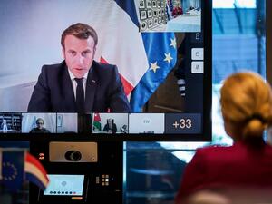 Dutch Minister for Development and Cooperation Sigrid Kaag (R) speaks with French President Emmanuel Macron (up R), Lebanon's president Michel Aoun (down R), Jordan King Abdullah II (down C) and other world leaders during a donor tele-conference concerning the situation in Lebanon, in The Hague, on August 9 2020, after a huge blast rocked the Lebanese capital of Beirut killing in excess of 150 people. Phil NIJHUIS / ANP / AFP