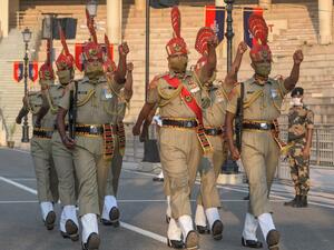 Indian Border Security Force (BSF) personnel perform during the daily beating of the retreat ceremony on the occasion of the country's 74th Independence Day at the India-Pakistan Wagah Border Post, about 35 kms from Amritsar on August 15, 2020. NARINDER NANU / AFP