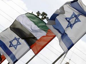 Israeli and United Arab Emirates flags line a road in the Israeli coastal city of Netanya, on August 16, 2020. JACK GUEZ / AFP