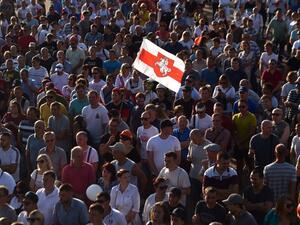 Belarus miners attend an opposition rally in Salyhorsk some 150 km south of Minsk, on August 17, 2020, after incumbent president rejected calls to step down in a defiant speech. The Belarusian strongman, who has ruled his ex-Soviet country with an iron grip since 1994, is under increasing pressure from the streets and abroad over his claim to have won re-election on August 9, with 80 percent of the vote. Sergei GAPON / AFP