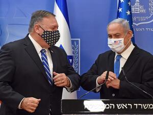 US Secretary of State Mike Pompeo (L) and Israeli Prime Minister Benjamin Netanyahu bump elbows ahead of making a joint statement to the press after meeting in Jerusalem, on August 24, 2020. (AFP)