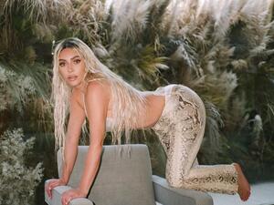 Kim Kardashian was back to work on a photoshoot in Malibu on Wednesday after taking a brief break from the celeb hustle to spend time mending her relationship with husband Kanye Weset. (Instagram)