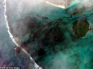 The bulk carrier ran aground on a coral reef on July 25 and the crew were evacuated but the national coast guard were not contacted. (AFP)