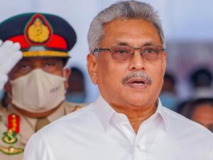 Sri Lankan President Gotabaya Rajapaksa sings the national anthem during a commemoration in Colombo on May 19 (AFP Photo/-)
