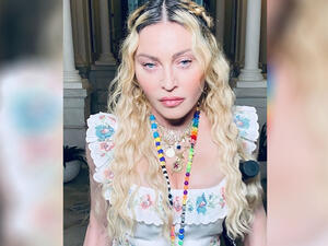 Madonna celebrates 62nd birthday with tray of marijuana and joint hanging from lips in Jamaica with beau Ahlamalik Williams