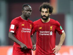 The former Reds defender, who has linked up with Zenit this summer, says there is a good-natured battle between the two star front men at Anfield (Photo: AFP)