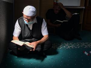 Muslim believers keep social distancing due to the Covid-19 pandemic as they attend Friday prayers at a mosque in southern Serbian city of Novi Pazar, early on August 28, 2020. Irfan LICINA / AFP