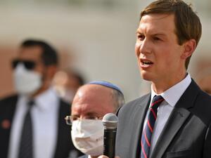 US Presidential Adviser Jared Kushner speaks near Head of Israel's National Security Council Meir Ben-Shabbat at Abu Dhabi airport following the arrival of the first-ever commercial flight from Israel to the UAE, on August 31, 2020. KARIM SAHIB / AFP