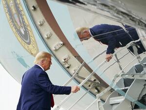 US President Donald Trump boards Air Force One at Wilmington International Airport in Wilmington, North Carolina, on September 2, 2020. Trump was in Wilmington to designate it as the first American World War II heritage city on the 75th anniversary of the end of WWII. MANDEL NGAN / AFP