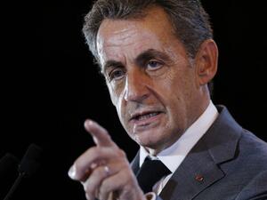 In this file photo taken on September 26, 2016 Former French president and candidate for the right-wing Les Republicains (LR) party primary ahead of the 2017 presidential election, Nicolas Sarkozy gestures as he speaks during a campaign meeting in Dozule. Nicolas Sarkozy, who must be tried at the end of 2020 in the so-called "tapping" case, will appear from March 17 to April 15, 2021 in a second trial on his campaign costs for the 2012 presidential election, the prosecution confirmed on September 3, 2020. C