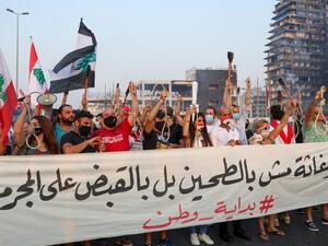 Lebanese demonstrators carry nooses during a demonstration to mark one month since the cataclysmic August 4 explosion that killed 191 people, at Beirut's port area in the Lebanese capital Beirut on September 4, 2020. ANWAR AMRO / AFP
