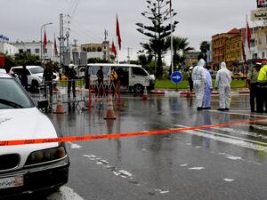 Tunisian forensic police investigate the site of an attack on Tunisian National Guard officers on September 6, 2020, in Sousse, south of the capital Tunis. Attackers with knives killed a Tunisian National Guard officer and wounded another before three assailants were shot dead in a firefight, the security force said, labelling it a "terrorist attack". The attack took place in the tourist district of the coastal city of Sousse, the site of the worst of several jihadist attacks in recent years, where 38 peopl