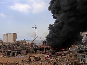 Lebanese firefighters try to put out a fire that broke out at Beirut's port area, on September 10, 2020. Thick black columns of smoke rose into the sky, as the army said it had engulfed a warehouse storing engine oil and vehicle tyres.  ANWAR AMRO / AFP