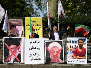 Reports published abroad say Afkari was condemned on the basis of confessions extracted under torture, prompting online campaigns of support for his release. JUSTIN TALLIS / AFP