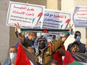Palestinians protest in Rafah in the southern Gaza Strip against Israeli normalisation deals with the United Arab Emirates and Bahrain on September 15, 2020, hours ahead of a signing ceremony at the White House. SAID KHATIB / AFP