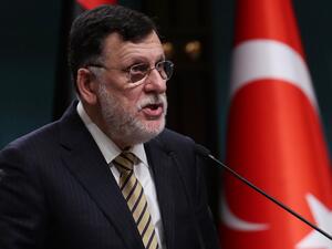 In this file photo taken on June 4, 2020, Libyan Prime Minister Fayez al-Sarraj holds a joint press conference at the Presidential Complex in Ankara. The head of Libya's UN-recognised Government of National Accord said on September 16 that he planned to step down within six weeks as part of efforts to broker a peace agreement. Libya has endured almost a decade of violent chaos since the 2011 NATO-backed uprising that toppled and killed veteran dictator Moamer Kadhafi. Adem ALTAN / AFP