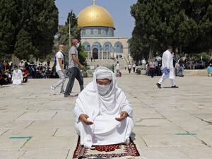 A Palestinian Muslim worshipper prays at the al-Aqsa mosque compound in the old city of Jerusalem on September 18, 2020. (AFP)