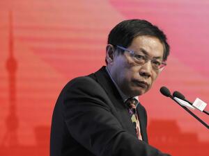 This photo taken on November 18, 2013 shows Ren Zhiqiang, the former chairman of state-owned property developer Huayuan Group, speaking at the China Public Welfare Forum in Beijing. A Chinese tycoon who called President Xi Jinping a clown and criticised his handling of the coronavirus outbreak was jailed for 18 years on September 22, 2020 for corruption, bribery and embezzlement of public funds. China News Service (CNS) / AFP