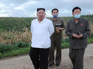 North Korean leader Kim Jong Un, pictured, has ordered soldiers and police to 'shoot on sight' anyone within half a mile of the country's border with China in a bid to stop the spread of coronavirus (AFP)