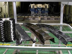 Nissan Achieves Breakthrough in Carbon Fiber Parts Production