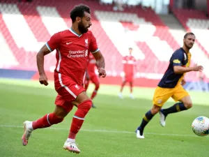 The German head coach talked up the Egyptian forward's contribution to the Reds' cause ahead of a heavyweight meeting with Chelsea (Photo: AFP)
